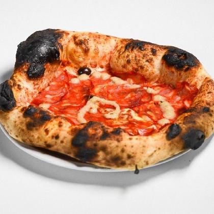 Pizza sortie du four