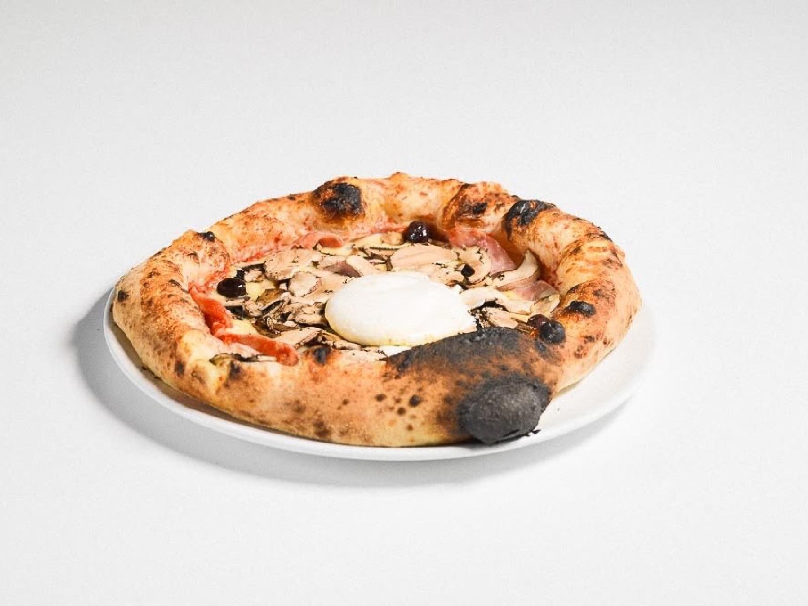 Pizza sortie du four